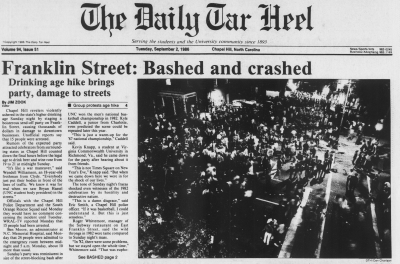 Top half of Daily Tar Heel front page from September 2, 1986, with photo of crowd on Franklin Street at night