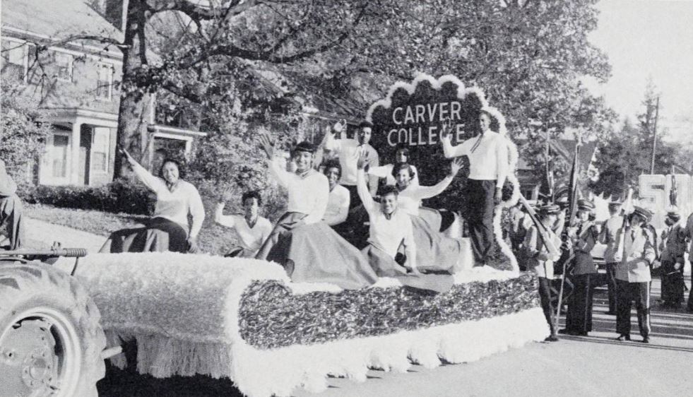 Carver Junior College waving on parade float.