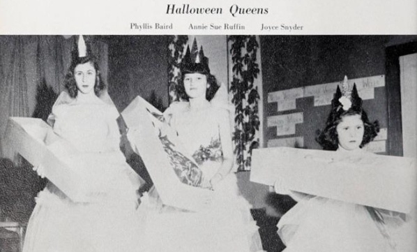 Photo of three Ahoskie High School students dressed up as "Halloween Queens".