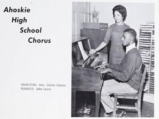Photo of Ahoskie High School chorus director and student at a piano.