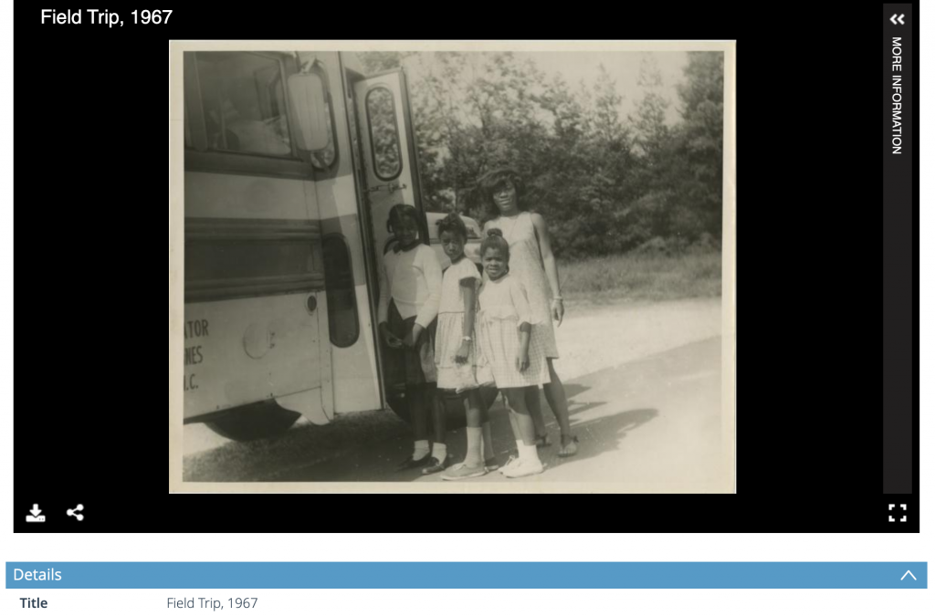 Image of a screenshot of four children, or three children and one adult, standing outside next to the open door of a bus. The title reads "Field Trip, 1967".