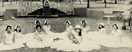 The May Queen and her court at Bennett College. From the 1963 edition of the Bennett Bell. 