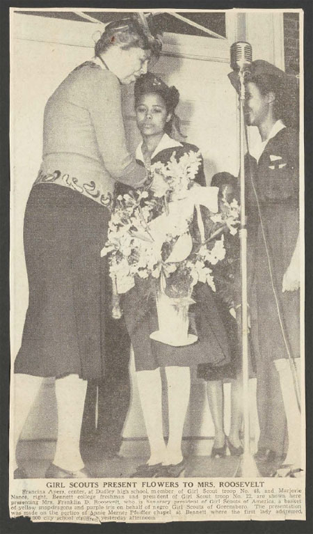 Eleanor Roosevelt receiving flowers from Girl Scouts, 1945