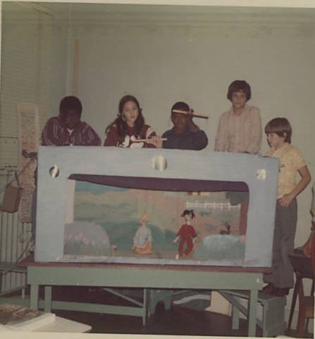 Sixth graders performing with puppets they built, November 1973.