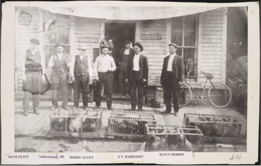 Men outside of a store in Benson, N.C.