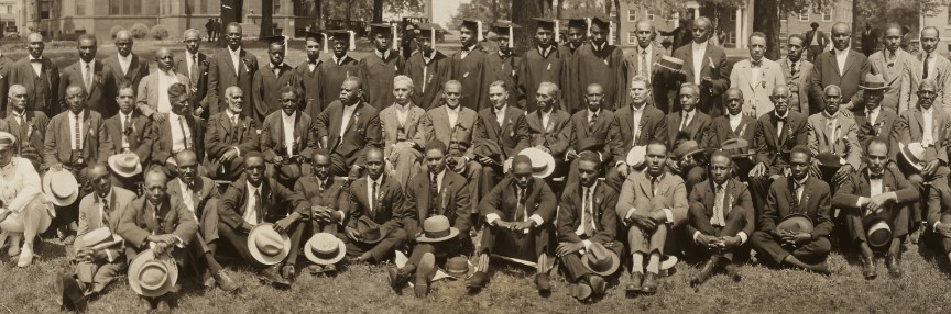 Cropped view of a 1925 Johnson C. Smith University reunion photo. The photo features recent graduates in their hats and gowns as well as older graduates.