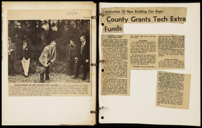 Two pages from a Johnston Community College scrapbook. The left side features a photo of a person breaking ground with a shovel and the right page features on article titled "County Grants Tech Extra Funds"