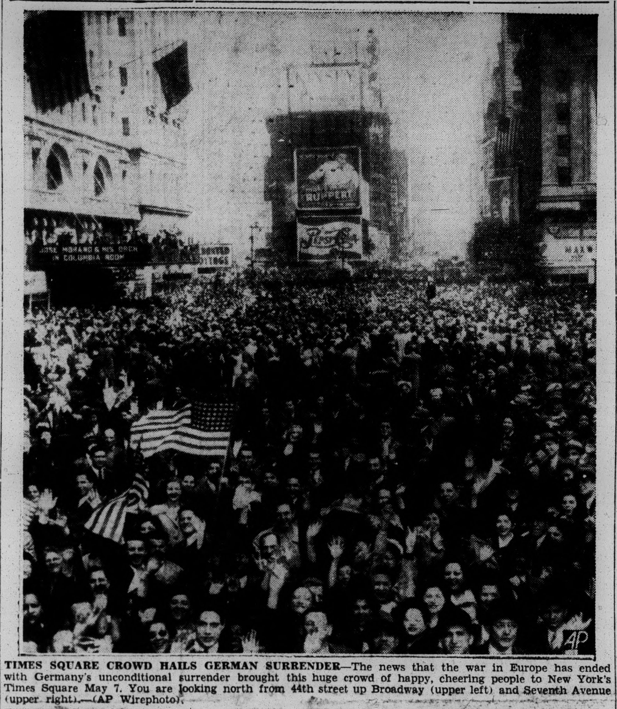 Crowd of people in New York City's Time Square, celebrating Victory in Europe Day.