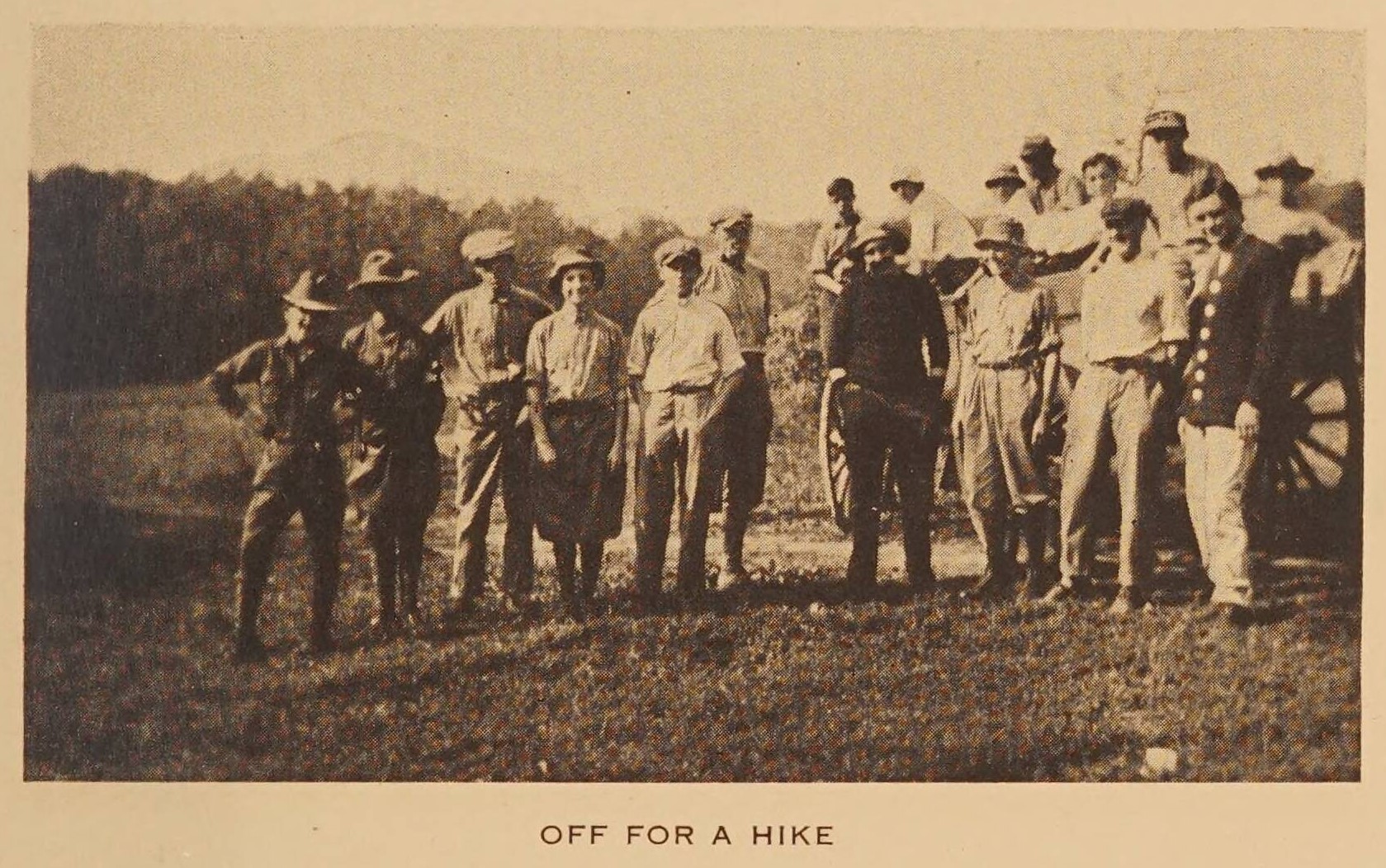 A group of boys in hats standing together before going on a hike. The caption under the photo reads: off for a hike.
