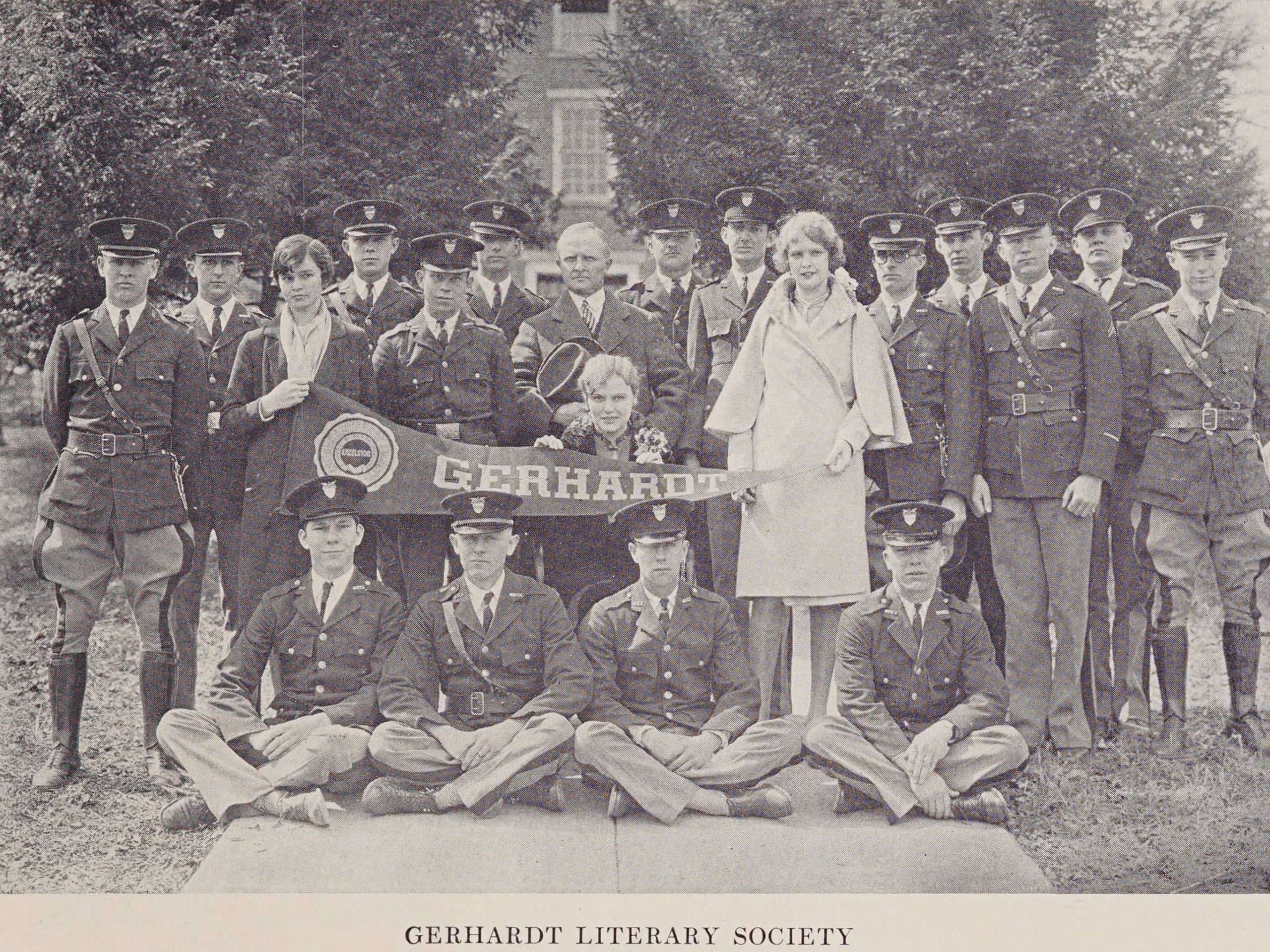 Group photograph of students of the Gerhardt Literary Society holding a pennant with "Gerhardt" on it.