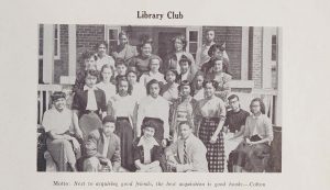 A group of students posing for the Library Club photo