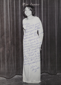 A photo of a student in a dress