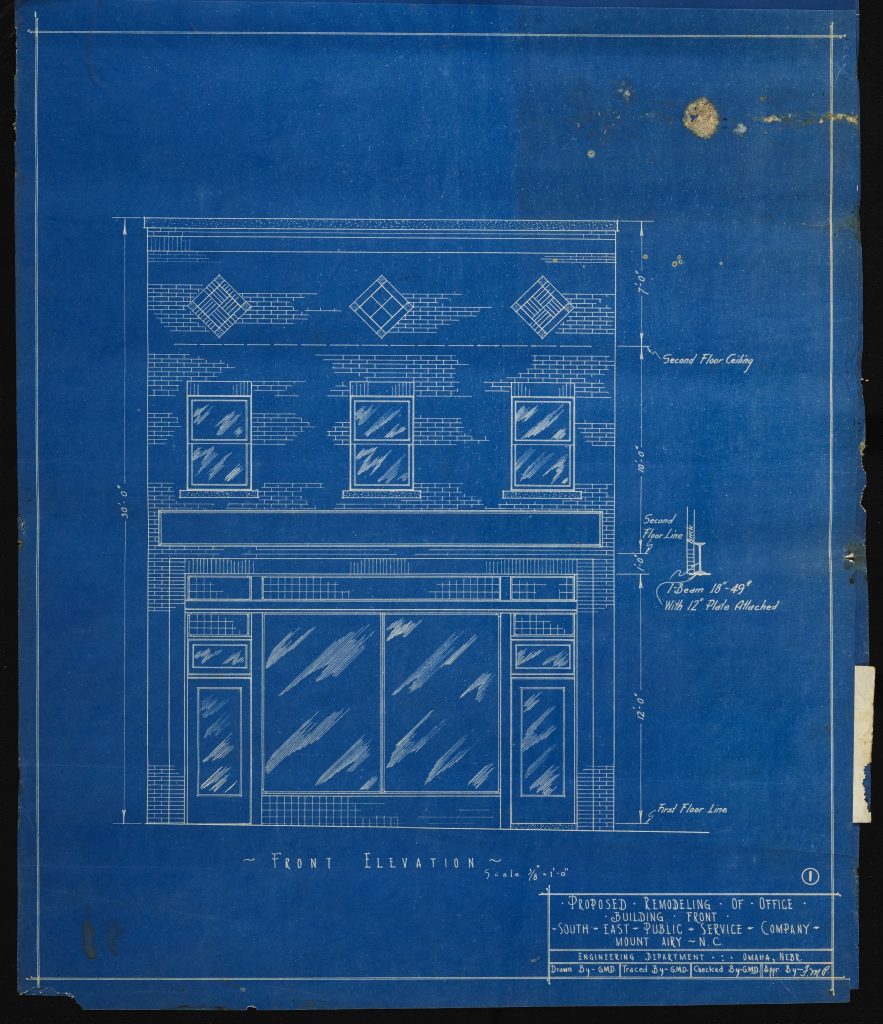 Blue print showing the façade of a two story office building