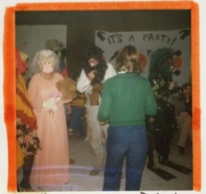 Scrapbook clipping, Halloween party with people in costumes