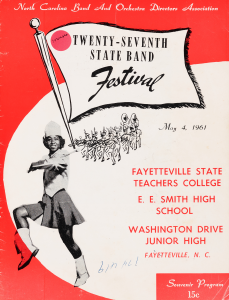 A red and white cover with a majorette marching and a flag that reads, "Twenty-Seventh State Band Festival."