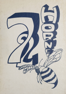 A white yearbook cover with a large, blue "72," a cartoon hornet, and the word "Hornet" written vertically.