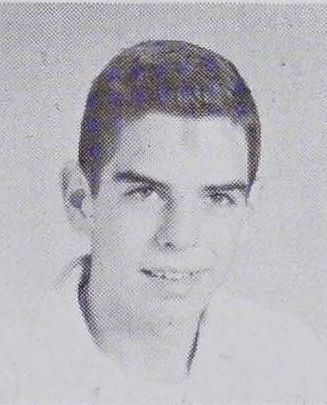 A black-and-white yearbook portrait of Tom Orr, a young, white man with dark hair. He is wearing a white shirt.