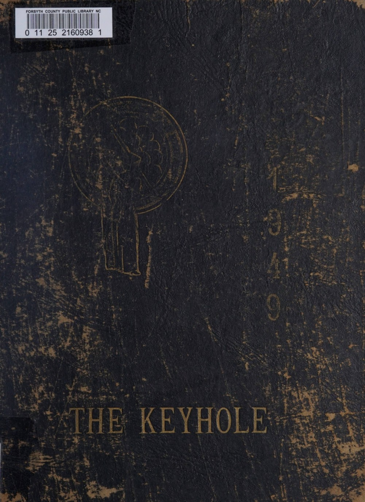 A black cover of a yearbook with faint gold writing that says "The Keyhole" and "1949."