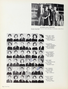 A page of a yearbook featuring a block of portraits in the bottom left corner and a group photo of students in the top right corner.