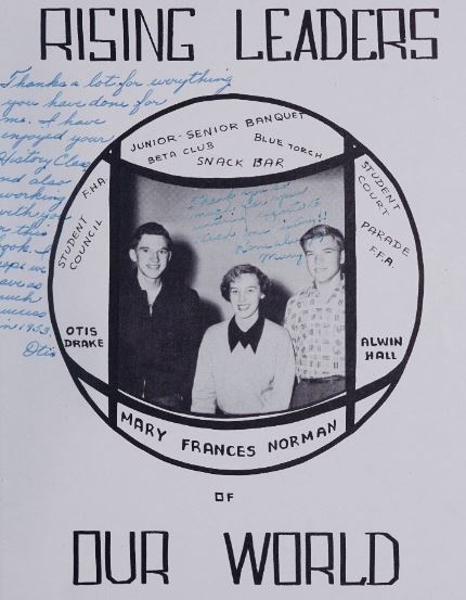 A black-and-white image of three people titled 'Rising Leaders' with cursive handwriting in blue ink.