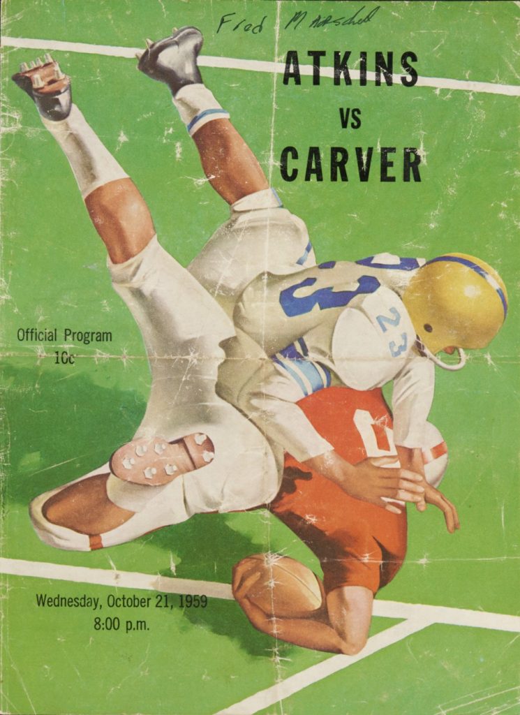 The cover of a football program from the Atkins vs. Carver game.