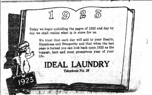 A cartoon of 1923's baby New Year observing an advertisement for Ideal Laundry.