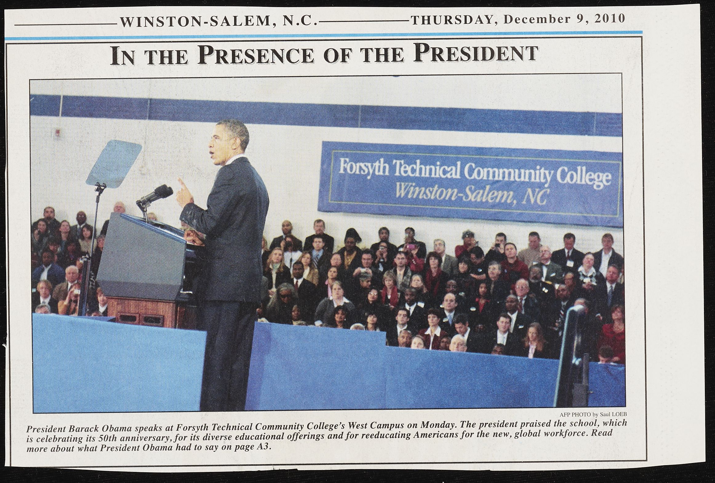 A clipping of an article about President Barack Obama speaking at Forsyth Technical Community College, including a photo of the event.