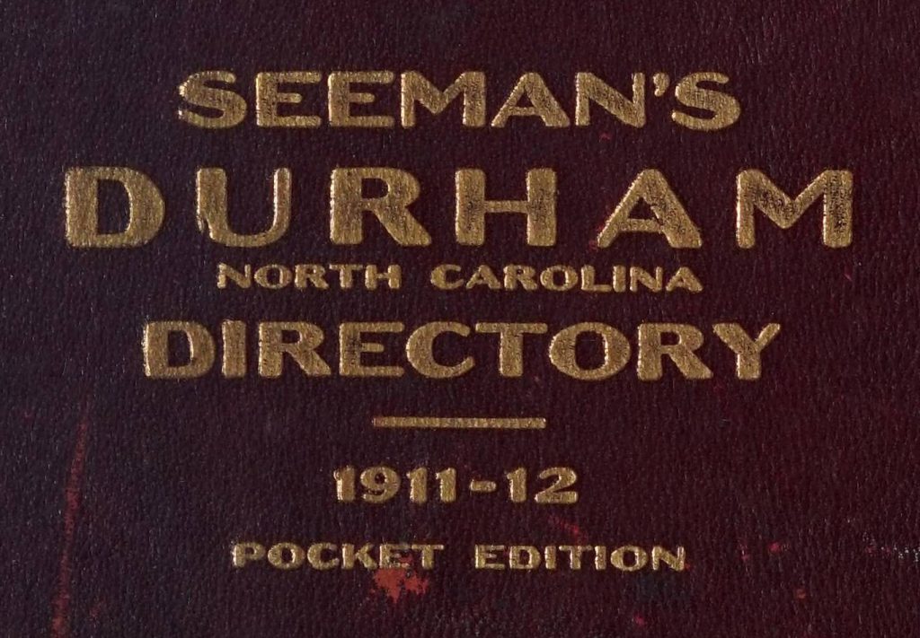 Maroon background with gold lettering that reads: Seeman's Durham, North Carolina Directory 1911-12 Pocket Edition.