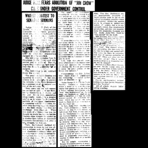 One article from newspaper on white paper, parts of the paper torn and faded.