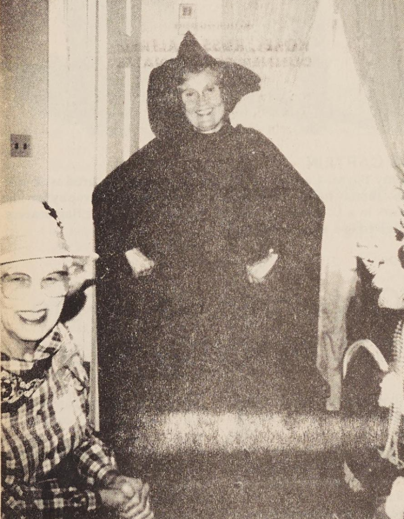Individual dressed as a witch.
