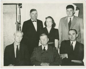 Five men and one woman, members of the Davie County draft board, pose for a photograph.