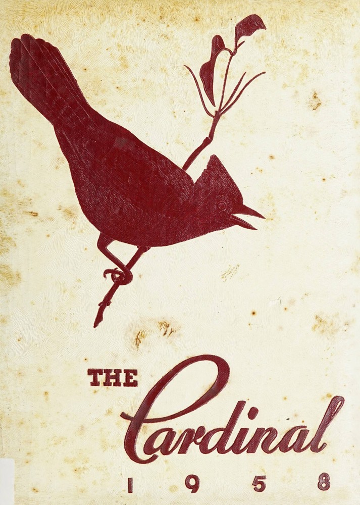 In all red ink the outline of a cardinal on a branch and "The Cardinal 1958"