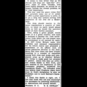 An article excerpt from a newspaper on white paper with little damage.