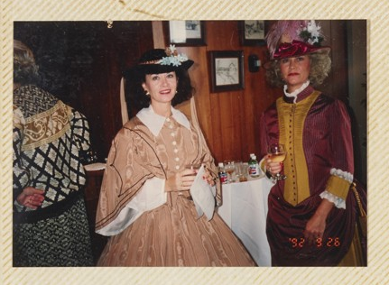 A photograph of two women in historic colonial dress.