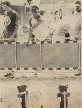 A group of students playing a ring-toss game