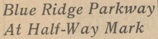 A clipping of a newspaper title that reads "Blue Ridge Parkway At Half-Way Mark."