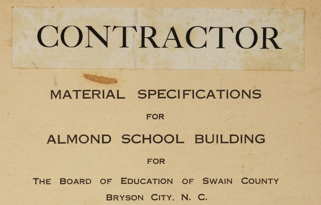 Cropped picture of the cover of a contractor packet. The text in the photo reads: CONTRACTOR. Material specifications for Almond School Building for The Board of Education of Swain County. Bryson City, N.C.