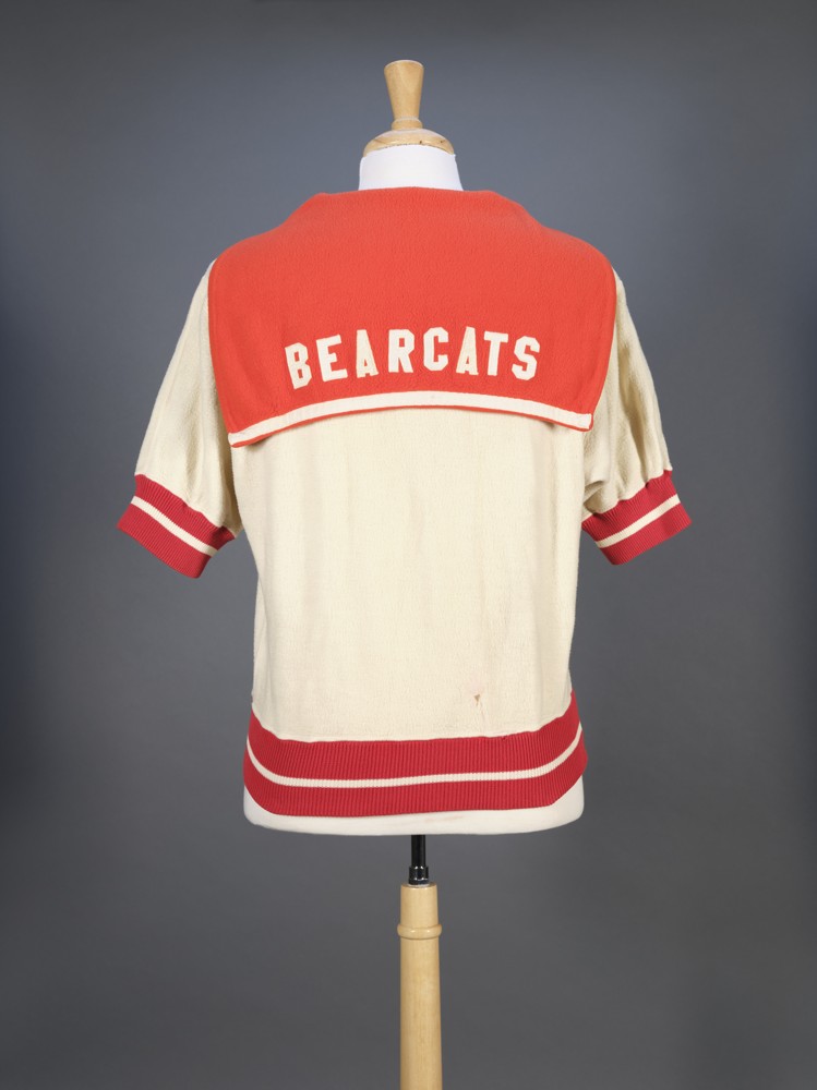 Red and white fleece quarter-zip with a capelet that says BEARCATS.