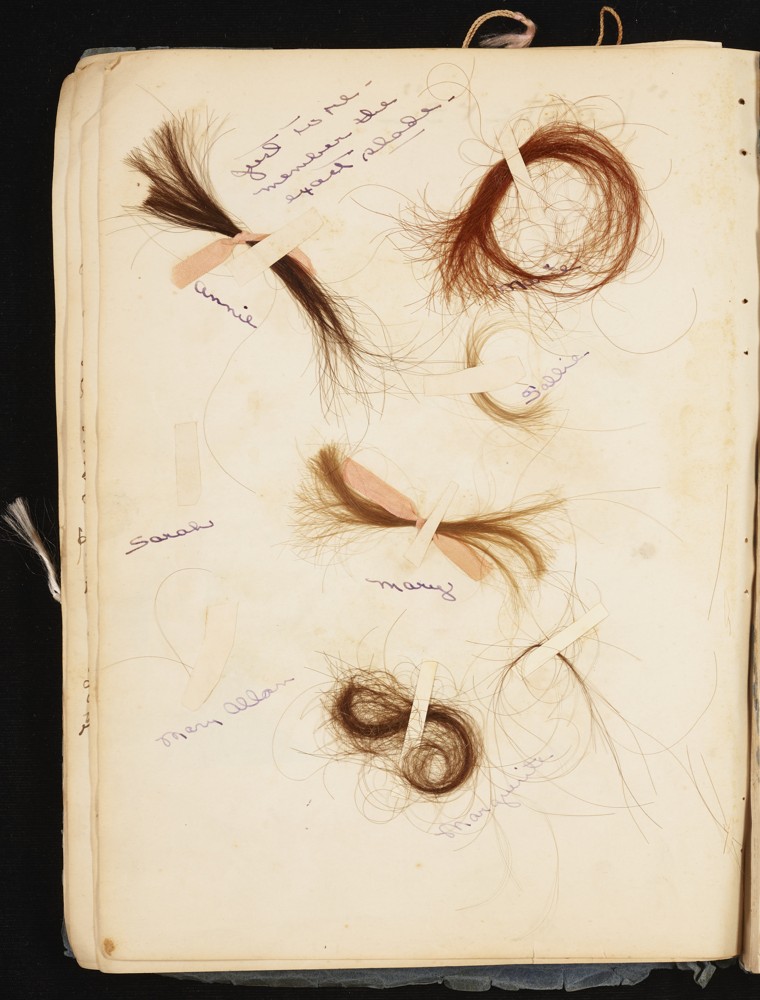 Locks of hair in various colors. Written at the top of the page in cursive is: Just to re-member the exact shade. Next to the hair locks are names, from left to right, top to bottom the names written are: Annie, Marie, Sallie, Sarah, Mary, Mary Allan, and Margurite [?].