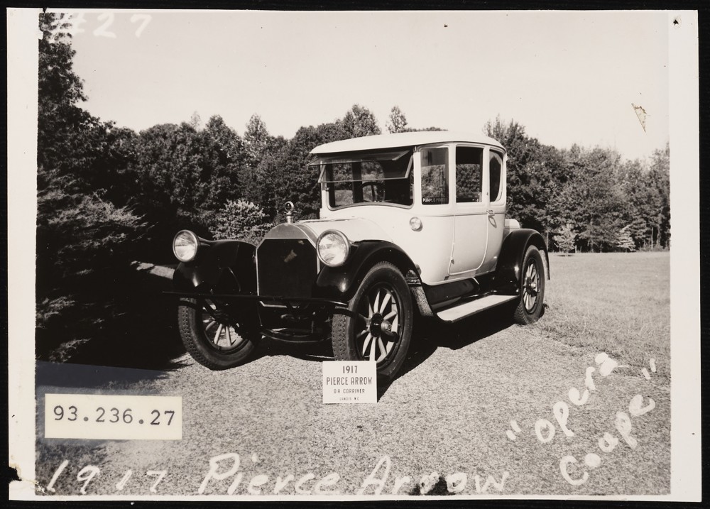 Image of a 1917 Pierce Arrow Opera Coupe with a sign propped against the front tire that reads: O. A. Corriher. Landis, N.C.
