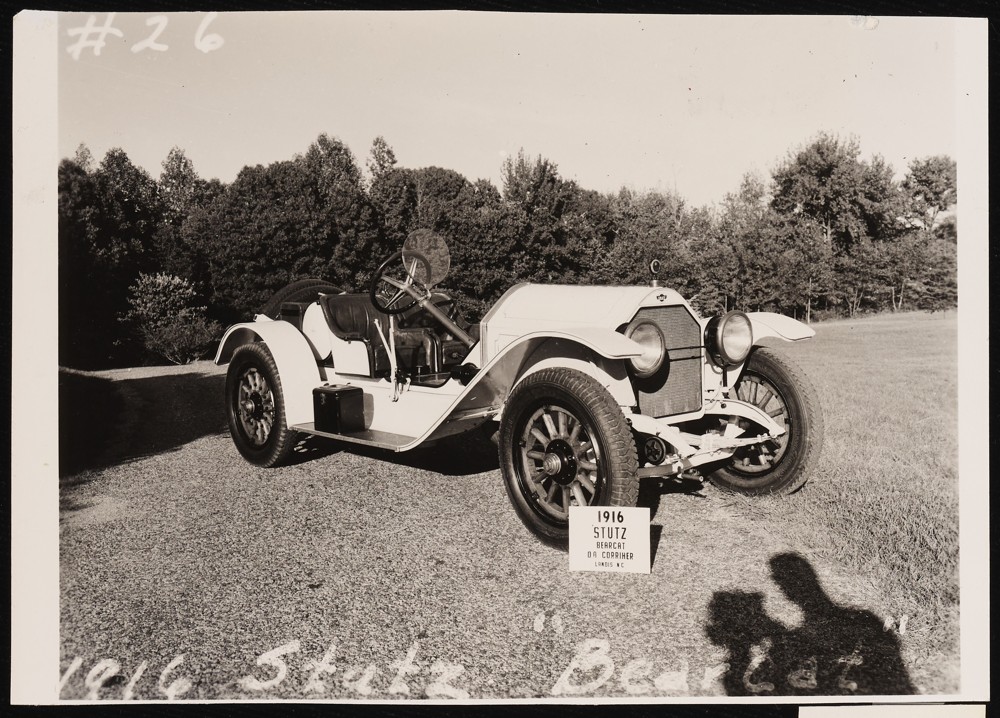 Image of a 1916 Stutz Bearcat with a sign propped against the front tire that reads: O. A. Corriher. Landis, N.C.